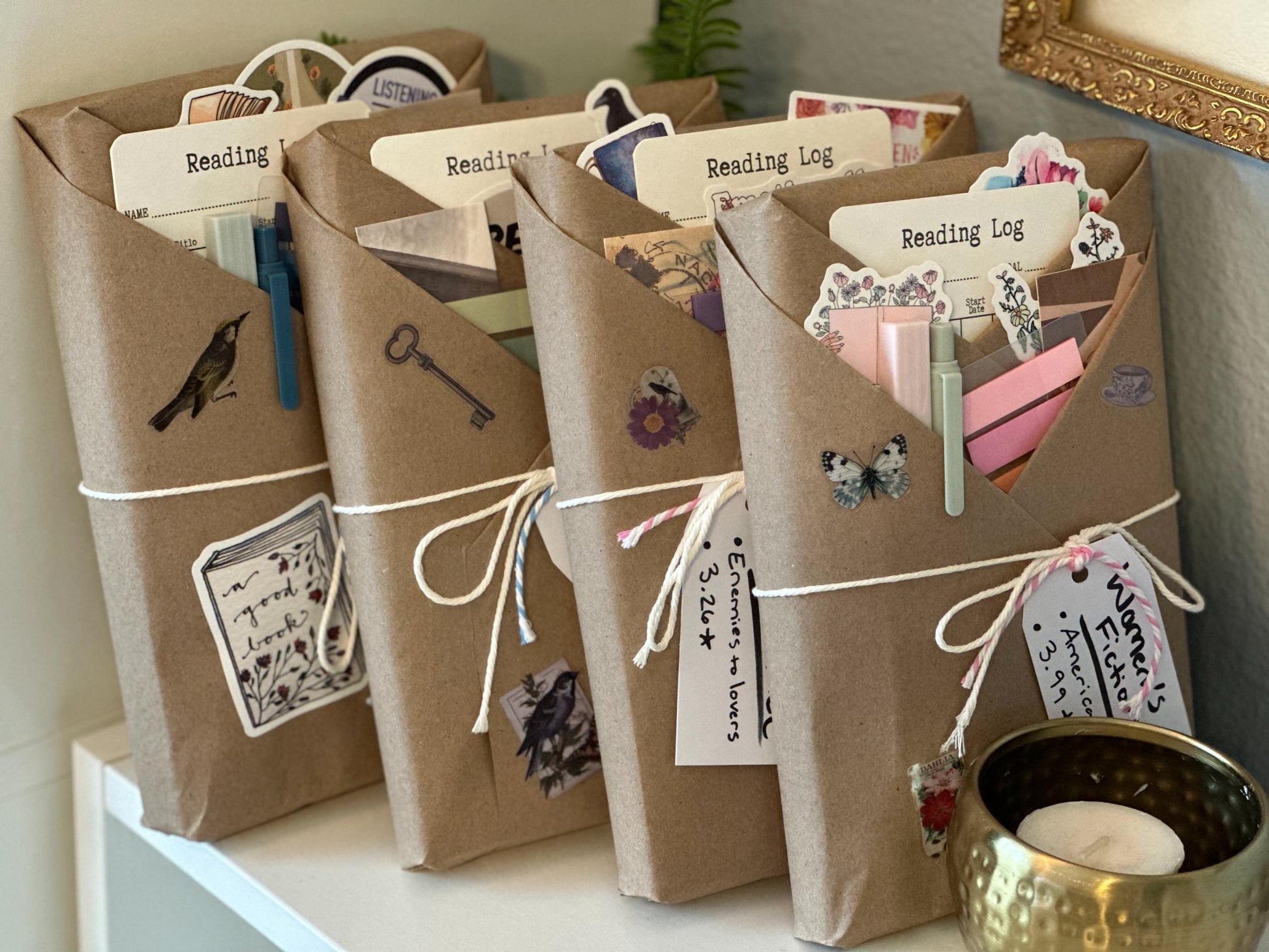 Four wrapped blind date with a book mystery books leaning against one another, ready to be gifted to a book reader